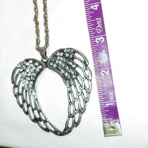 Long chain necklace with Angel wings in heart shape pendant